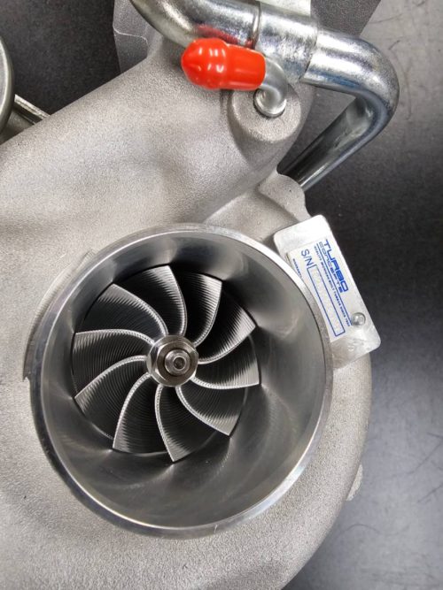 Front view of billet VF52 RHF55 turbocharger with custom 50mm inducer billet compressor wheel, designed for Subaru EJ25 engines